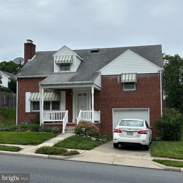 603 Jefferson Blvd, Reading, PA 19609 - view of front of home featuring brick siding, an attached garage, a porch, and a chimney