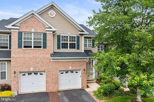 25 Kennedy Ct, Princeton, NJ 08540 - view of front of property with driveway, a garage, roof with shingles, and brick siding