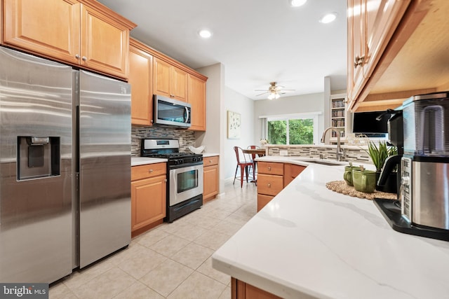 25 Kennedy Ct, Princeton, NJ 08540 - kitchen featuring appliances with stainless steel finishes, a sink, decorative backsplash, a ceiling fan, and recessed lighting
