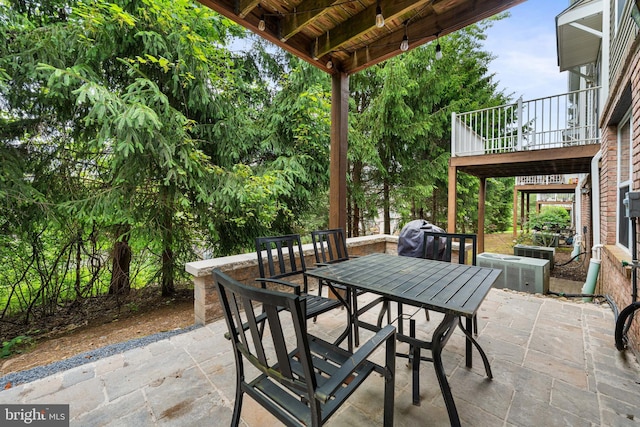 25 Kennedy Ct, Princeton, NJ 08540 - view of patio featuring outdoor dining space and central AC unit