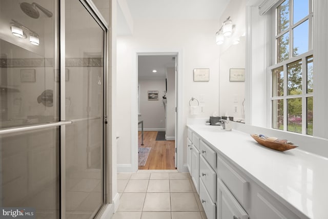 4700 Upton St NW Unit 3, Washington, DC 20016 - bathroom with vanity, a stall shower, tile patterned floors, baseboards, and recessed lighting