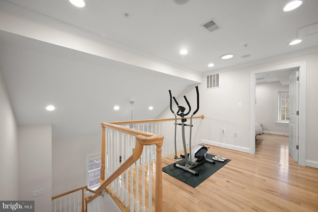4700 Upton St NW Unit 3, Washington, DC 20016 - workout room featuring wood finished floors, crown molding, recessed lighting, and baseboards