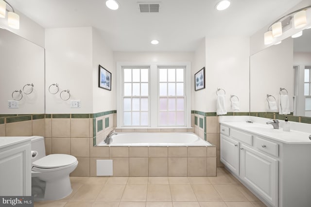 4700 Upton St NW Unit 3, Washington, DC 20016 - full bath with healthy amount of natural light, vanity, toilet, recessed lighting, and wainscoting