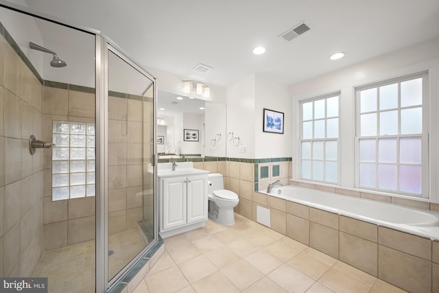 4700 Upton St NW Unit 3, Washington, DC 20016 - full bath with a stall shower, vanity, tile patterned flooring, a bath, and toilet