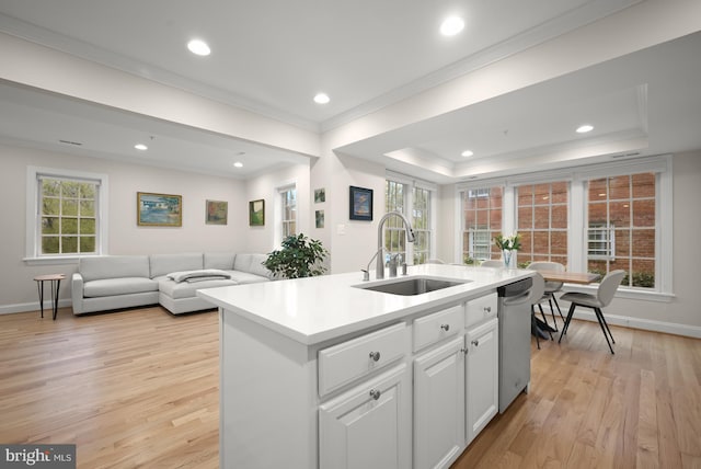 4700 Upton St NW Unit 3, Washington, DC 20016 - kitchen with a sink, crown molding, open floor plan, light wood finished floors, and stainless steel dishwasher