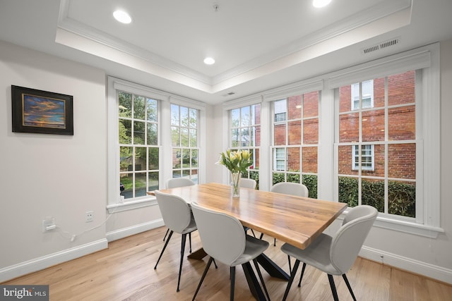 4700 Upton St NW Unit 3, Washington, DC 20016 - dining area with baseboards, a tray ceiling, ornamental molding, light wood-style flooring, and recessed lighting