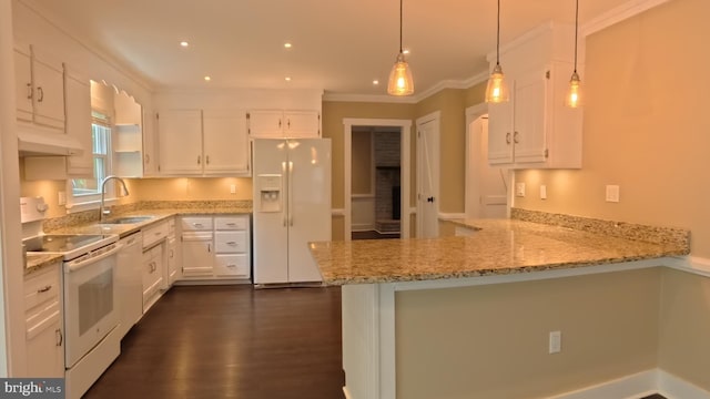 3204 Aquia Dr, Stafford, VA 22554 - kitchen with white appliances, a sink, a peninsula, under cabinet range hood, and light stone counters