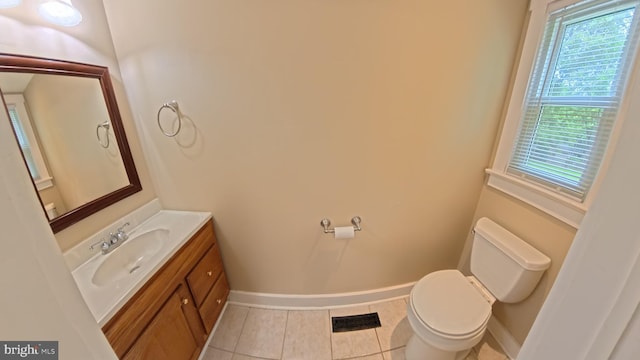 3204 Aquia Dr, Stafford, VA 22554 - bathroom with tile patterned floors, toilet, vanity, and baseboards