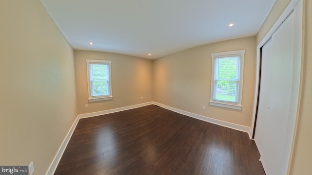 3204 Aquia Dr, Stafford, VA 22554 - unfurnished bedroom featuring dark wood-style flooring, baseboards, a closet, and recessed lighting