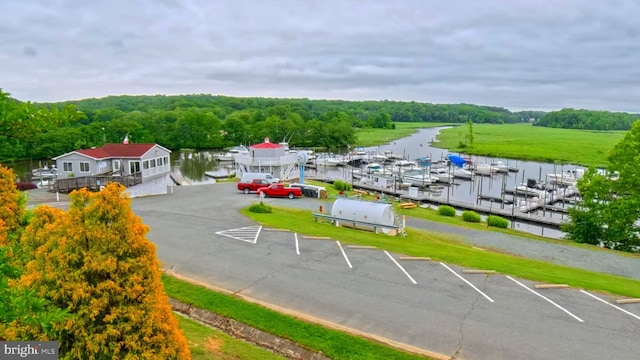3204 Aquia Dr, Stafford, VA 22554 - uncovered parking lot featuring a water view, view of marina, and a forest view