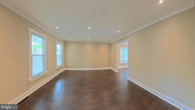 3204 Aquia Dr, Stafford, VA 22554 - empty room with plenty of natural light, dark wood-style flooring, baseboards, ornamental molding, and recessed lighting
