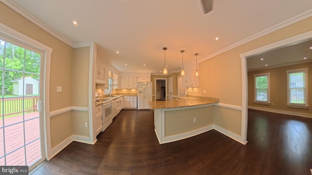 3204 Aquia Dr, Stafford, VA 22554 - kitchen with white appliances, a peninsula, dark wood-style floors, white cabinetry, and a sink
