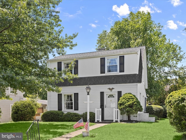 1229 7 Oaks Rd, Halethorpe, MD 21227 - view of front of property featuring a front lawn and roof with shingles