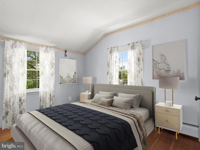 1229 7 Oaks Rd, Halethorpe, MD 21227 - bedroom featuring lofted ceiling, wood finished floors, crown molding, and a baseboard heating unit
