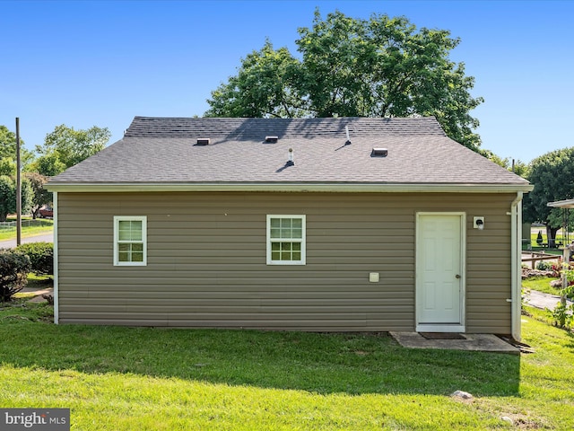 111 S Buchannan St, Ranson, WV 25438 - rear view of property with a lawn and roof with shingles