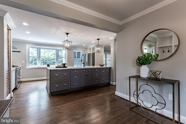 5632 Glenwood Dr, Alexandria, VA 22310 - kitchen with gray cabinetry, stainless steel appliances, a chandelier, dark wood finished floors, and ornamental molding