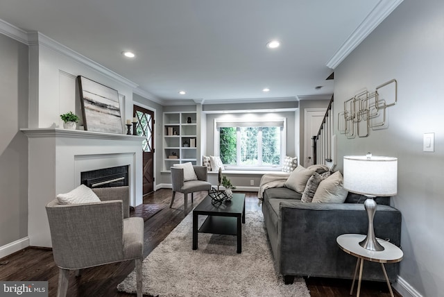 5632 Glenwood Dr, Alexandria, VA 22310 - living room with a glass covered fireplace, ornamental molding, wood finished floors, stairs, and recessed lighting