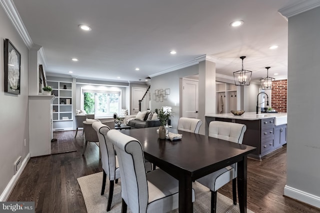 5632 Glenwood Dr, Alexandria, VA 22310 - dining area featuring recessed lighting, crown molding, dark wood-style flooring, stairway, and a chandelier