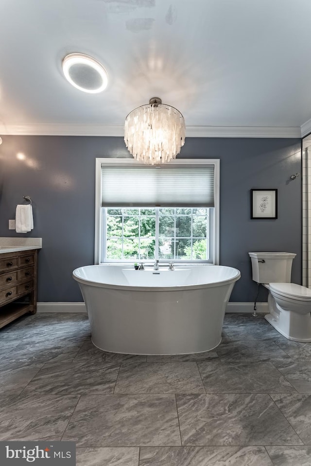 5632 Glenwood Dr, Alexandria, VA 22310 - full bathroom with crown molding, a soaking tub, a chandelier, vanity, and marble look tiles