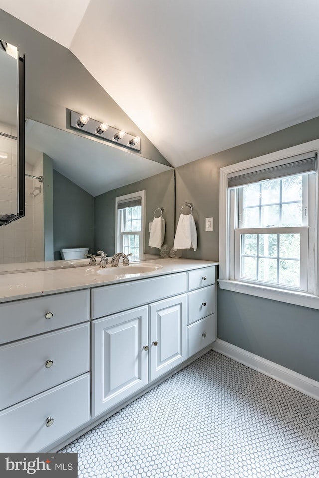 5632 Glenwood Dr, Alexandria, VA 22310 - bathroom featuring lofted ceiling and vanity