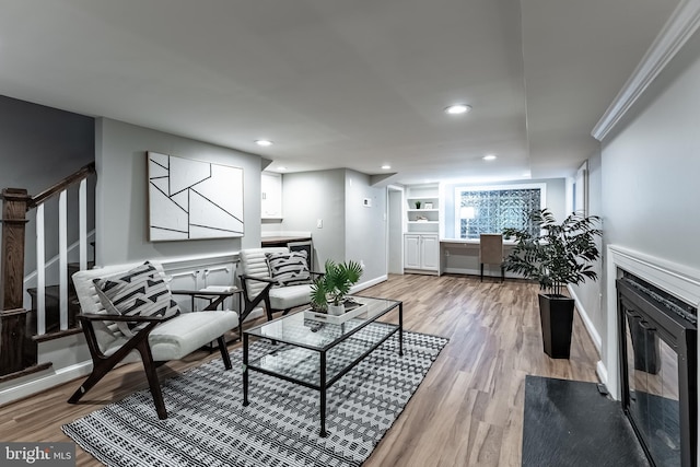 5632 Glenwood Dr, Alexandria, VA 22310 - living room featuring stairway, light wood-style floors, and recessed lighting