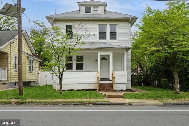 2222 Spruce St, Ewing, NJ 08638 - traditional style home with roof with shingles and a front lawn