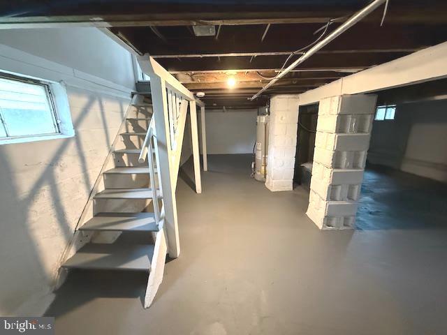 2222 Spruce St, Ewing, NJ 08638 - basement with stairway and gas water heater
