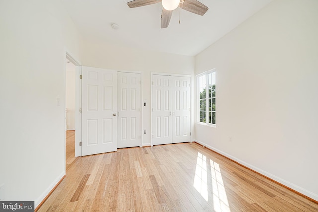 1812 N Culpeper St, Arlington, VA 22207 - unfurnished bedroom with two closets, wood finished floors, and baseboards