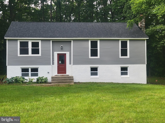 5311 Cove View Dr, Saint Leonard, MD 20685 - bi-level home featuring entry steps, a front lawn, a chimney, and brick siding
