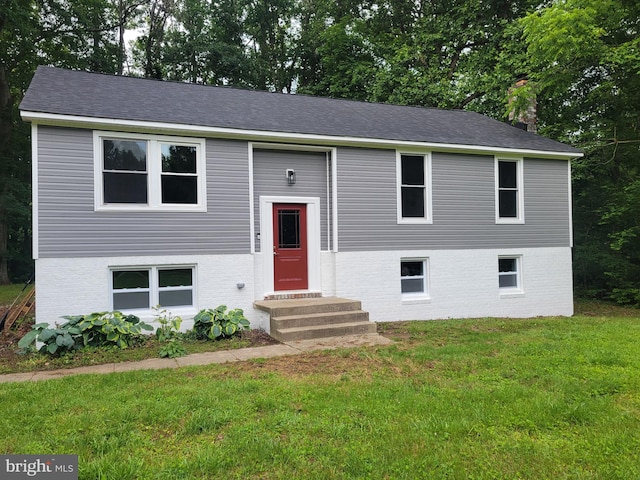 5311 Cove View Dr, Saint Leonard, MD 20685 - raised ranch featuring entry steps, a chimney, a front lawn, and brick siding