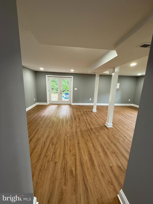 5311 Cove View Dr, Saint Leonard, MD 20685 - spare room with wood finished floors, baseboards, french doors, and recessed lighting