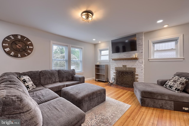 616 New Holland Ave, Lancaster, PA 17602 - living area featuring hardwood / wood-style floors, a fireplace, and recessed lighting