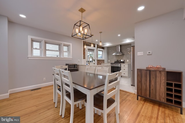 616 New Holland Ave, Lancaster, PA 17602 - dining space featuring light wood finished floors, recessed lighting, and a chandelier