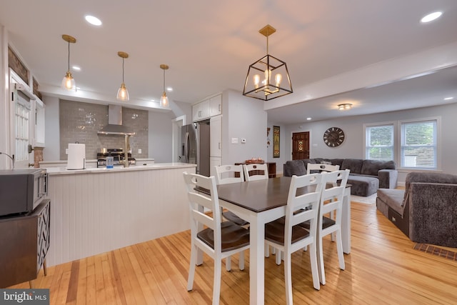616 New Holland Ave, Lancaster, PA 17602 - dining space with light wood-type flooring, a chandelier, and recessed lighting