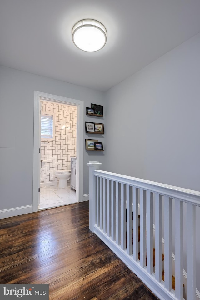 616 New Holland Ave, Lancaster, PA 17602 - corridor with wood finished floors and an upstairs landing