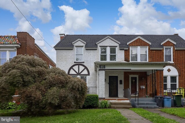 616 New Holland Ave, Lancaster, PA 17602 - view of front of house featuring brick siding and a porch