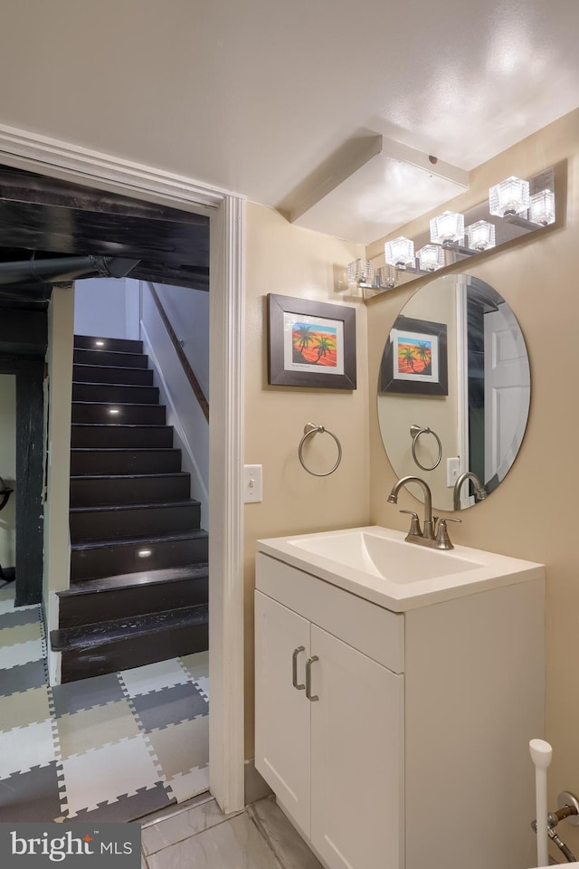 616 New Holland Ave, Lancaster, PA 17602 - bathroom featuring vanity and marble finish floors