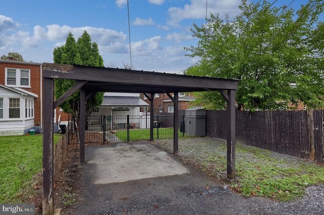 616 New Holland Ave, Lancaster, PA 17602 - view of vehicle parking featuring a carport and a gate