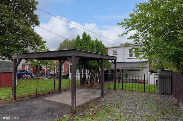 616 New Holland Ave, Lancaster, PA 17602 - view of patio featuring a carport and driveway