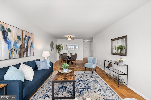 1435 4th St SW Unit B513, Washington, DC 20024 - living area featuring baseboards and ceiling fan