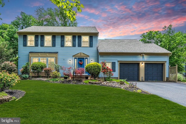 20 Elkshead Ter, Hamilton, NJ 08620 - colonial inspired home with asphalt driveway, an attached garage, and a yard