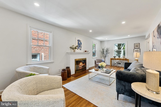 1604 Crittenden St NE, Washington, DC 20017 - living area with wood finished floors, a fireplace, recessed lighting, and baseboards