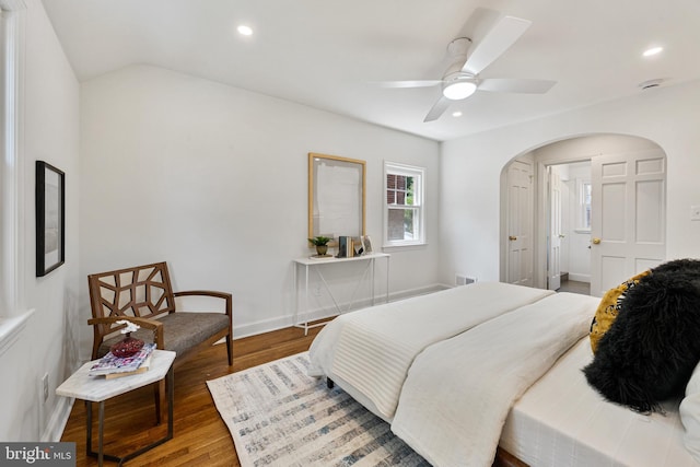 1604 Crittenden St NE, Washington, DC 20017 - bedroom with arched walkways, recessed lighting, wood finished floors, baseboards, and ceiling fan