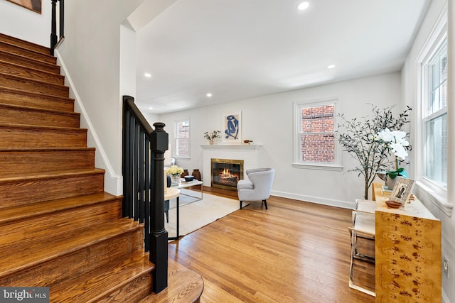 1604 Crittenden St NE, Washington, DC 20017 - entrance foyer featuring healthy amount of natural light, stairs, wood finished floors, recessed lighting, and a glass covered fireplace