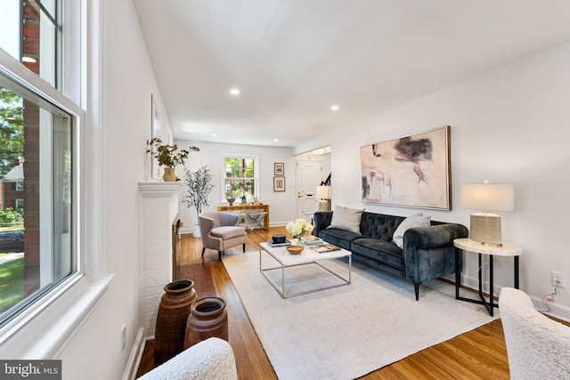 1604 Crittenden St NE, Washington, DC 20017 - living room featuring wood finished floors, recessed lighting, and baseboards