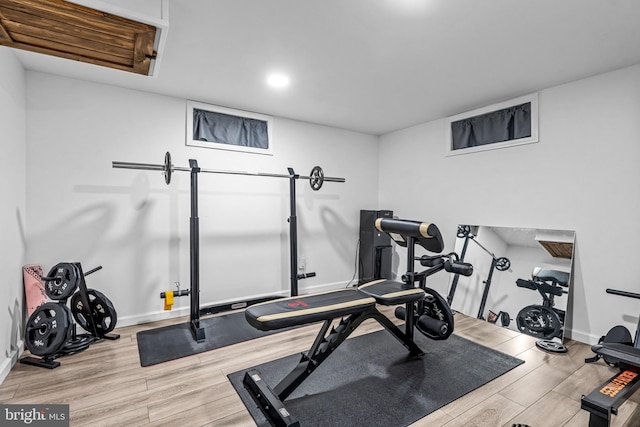 208 N Warwick Rd, Magnolia, NJ 08049 - workout room with wood finished floors, recessed lighting, and baseboards