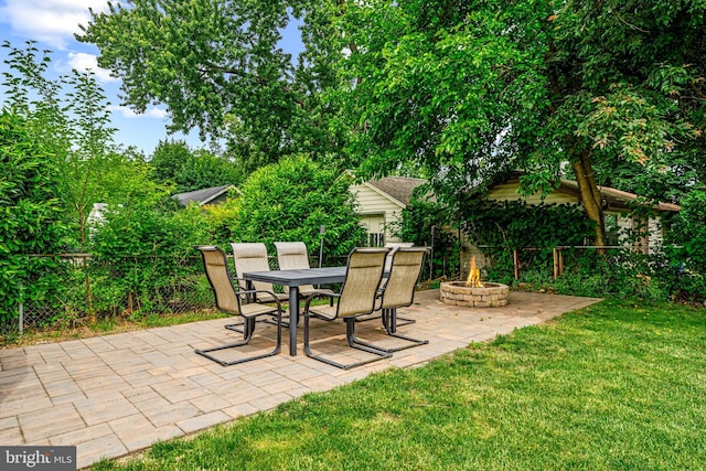 208 N Warwick Rd, Magnolia, NJ 08049 - view of patio with an outdoor fire pit and outdoor dining space