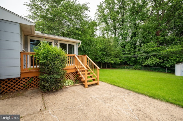 38 Gill Dr, Newark, DE 19713 - view of patio featuring a wooden deck and view of wooded area