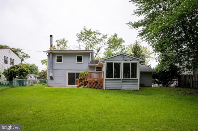 38 Gill Dr, Newark, DE 19713 - back of property with stairs, a sunroom, and a wooden deck