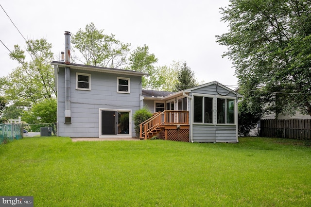 38 Gill Dr, Newark, DE 19713 - back of property featuring a sunroom, stairs, a chimney, and cooling unit